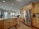 Large kitchen equipped with modern appliances